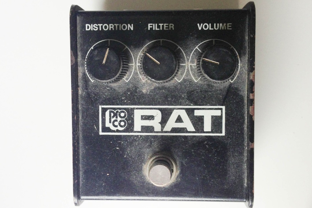 A Pro Co RAT distortion guitar effects pedal, one of the classic amp-in-a-box distortion stompboxes guitarists choose between